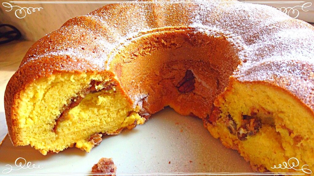 An easy coffee cake recipe with yellow cake and vanilla pudding, nuts, and sugar cinnamon