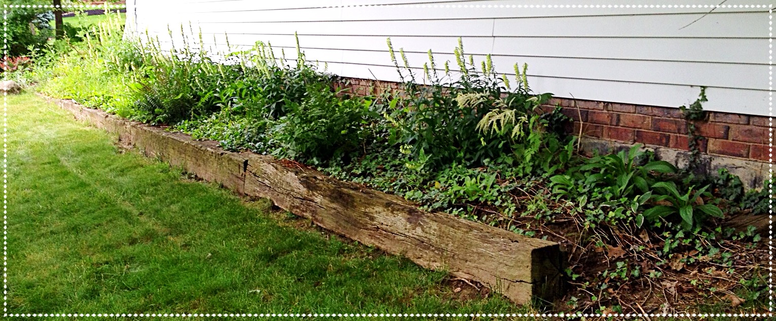 Railroad ties as edging along the house
