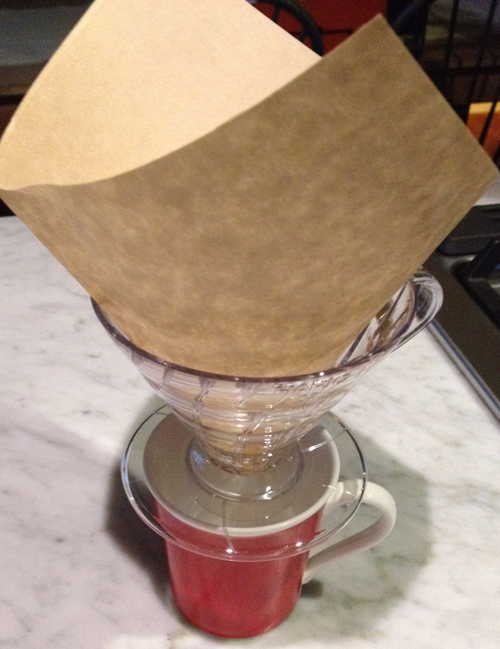 funnel over mug with rectangular filter