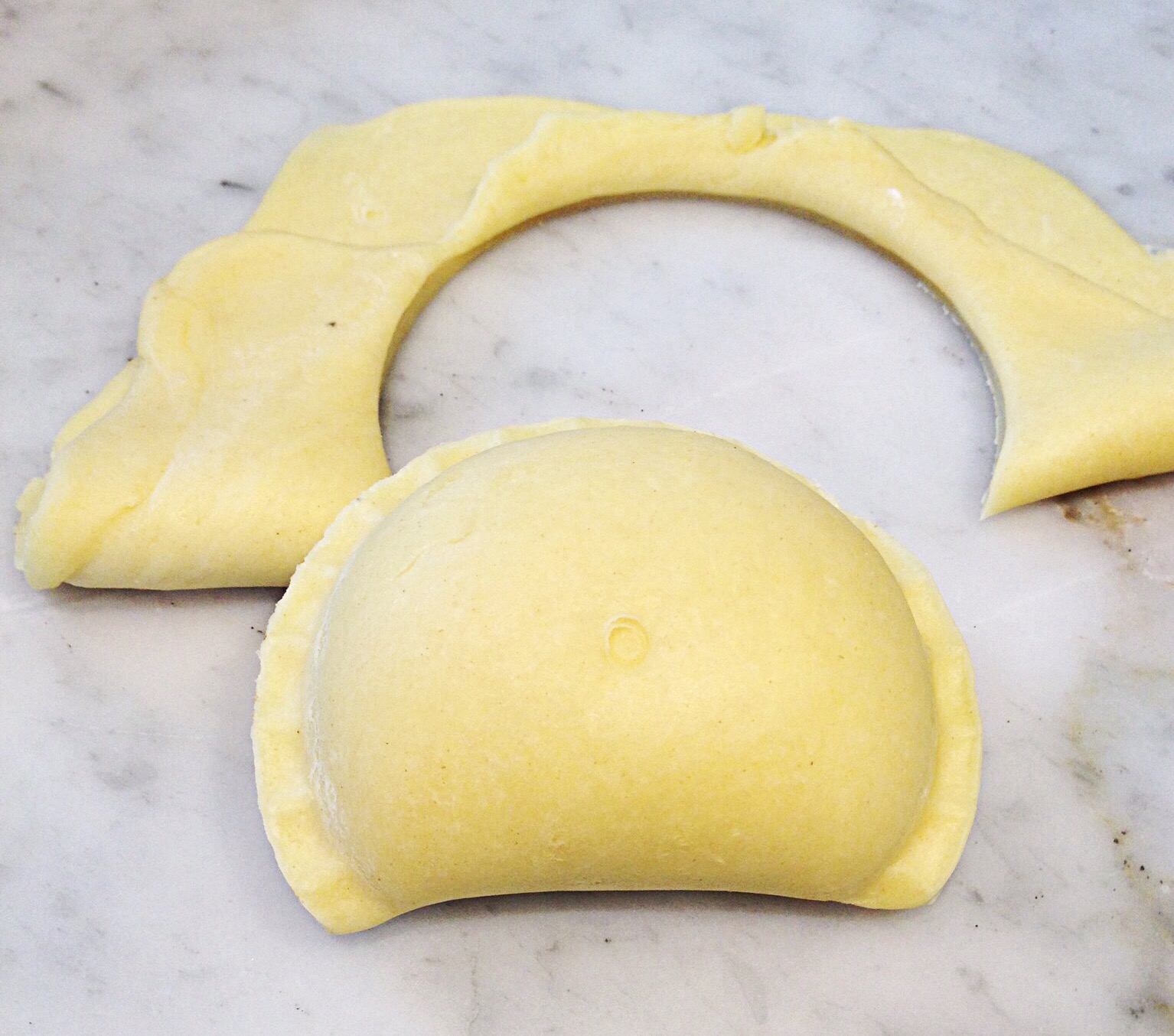 Photo showing pierogi cut with a tart press.