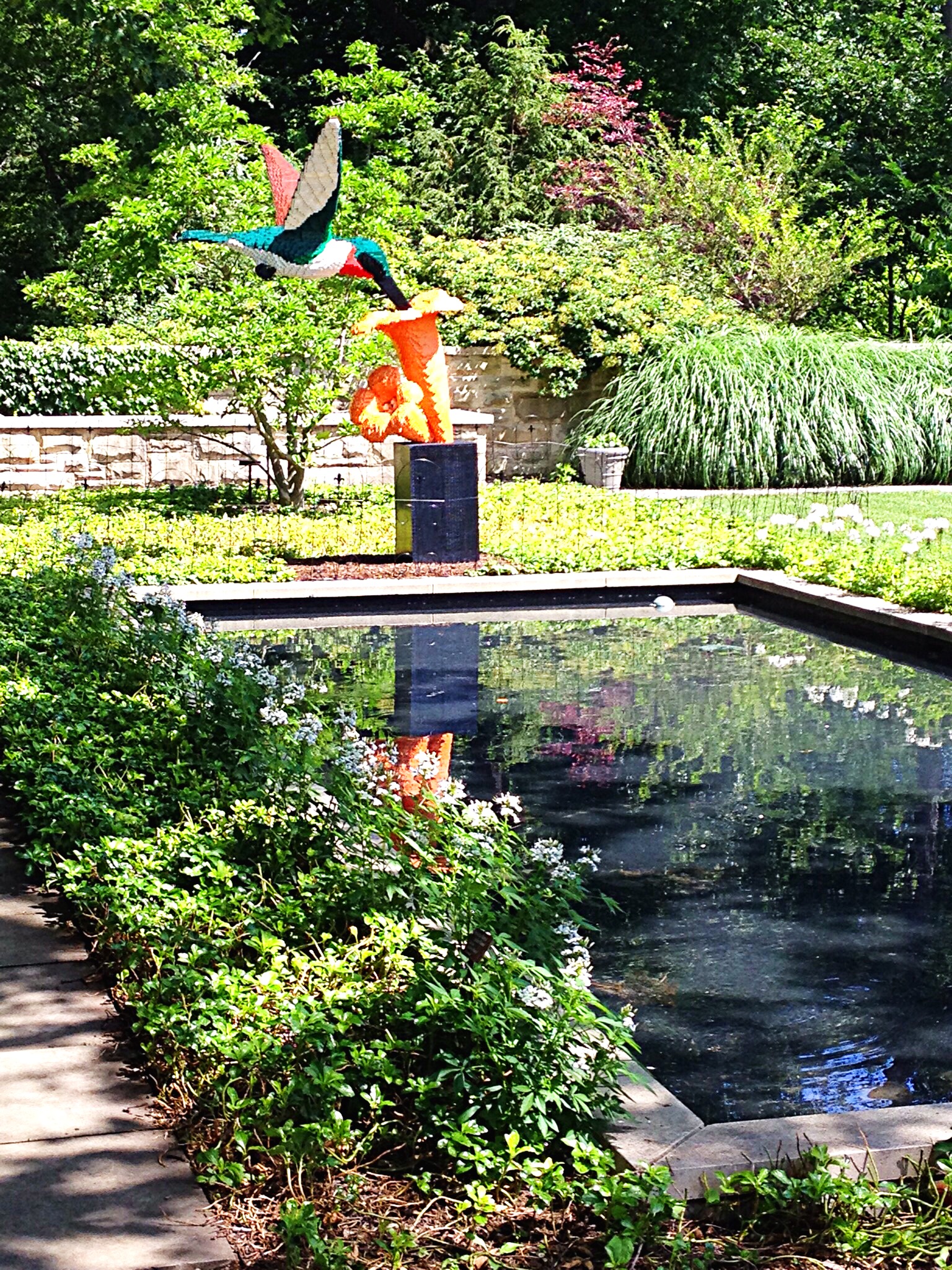 photo of hummingbird sculpture made of Legos