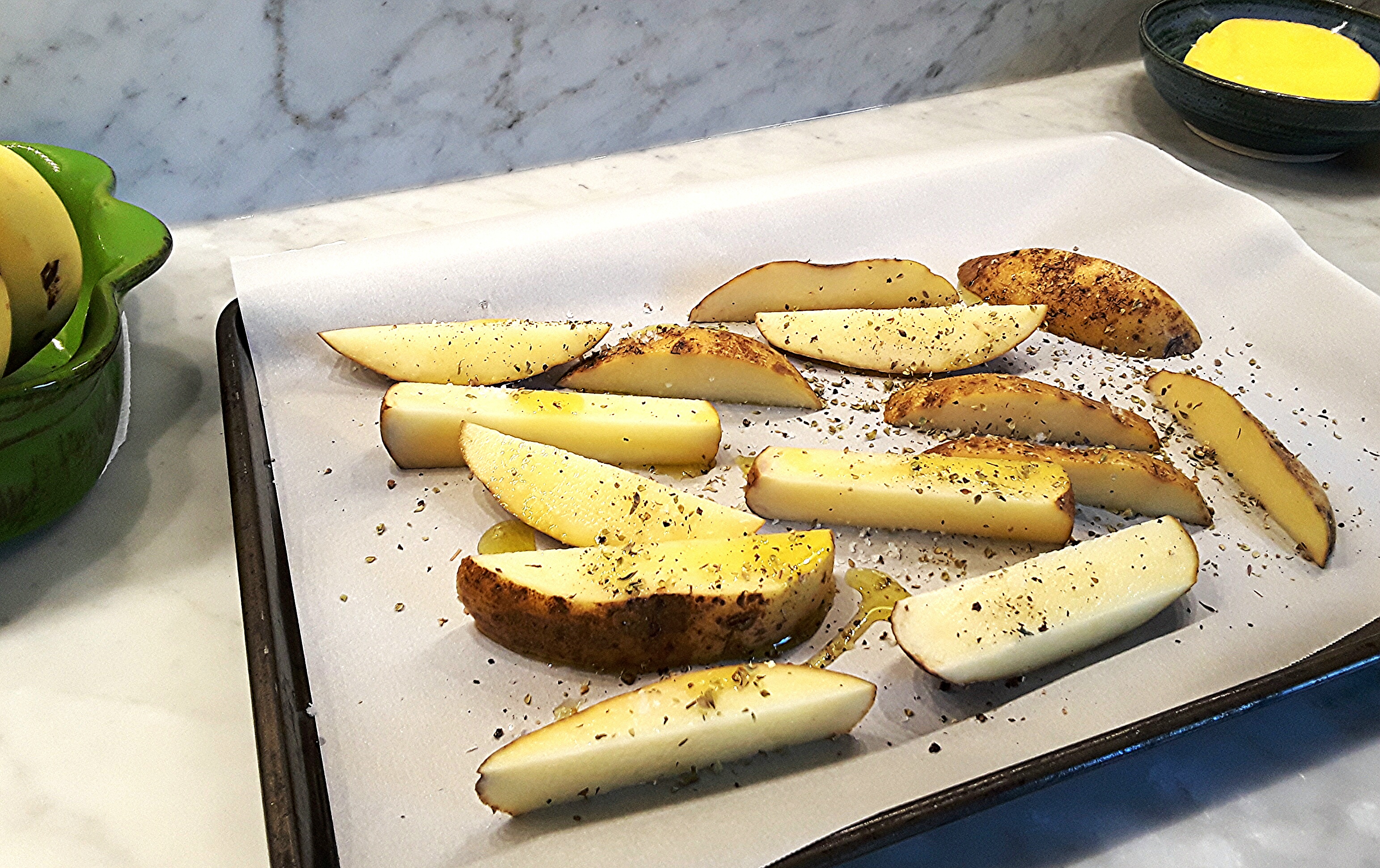 potatoes seasoned and ready to bake