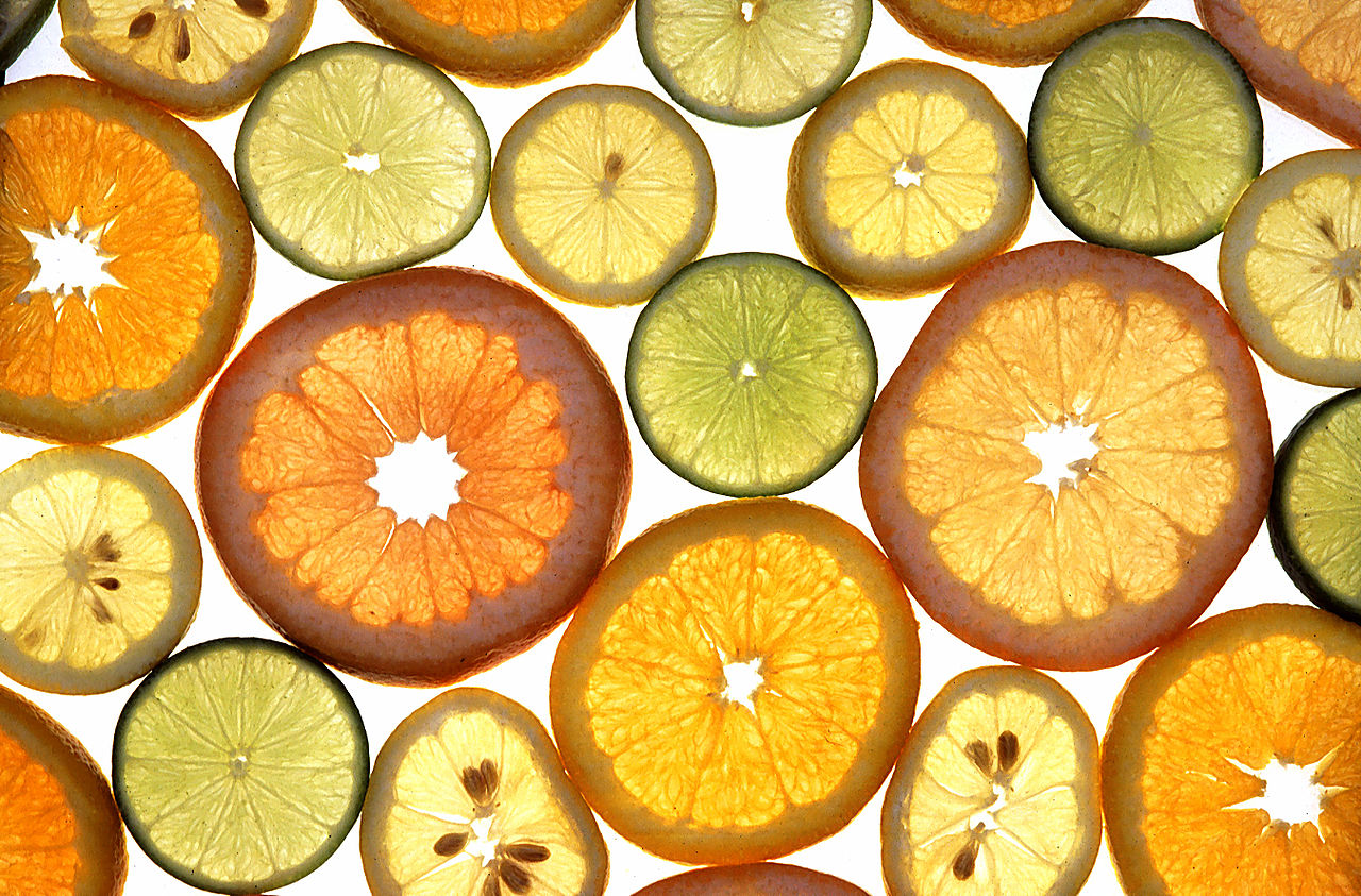 sliced grapefruit, limes, oranges, lemons
