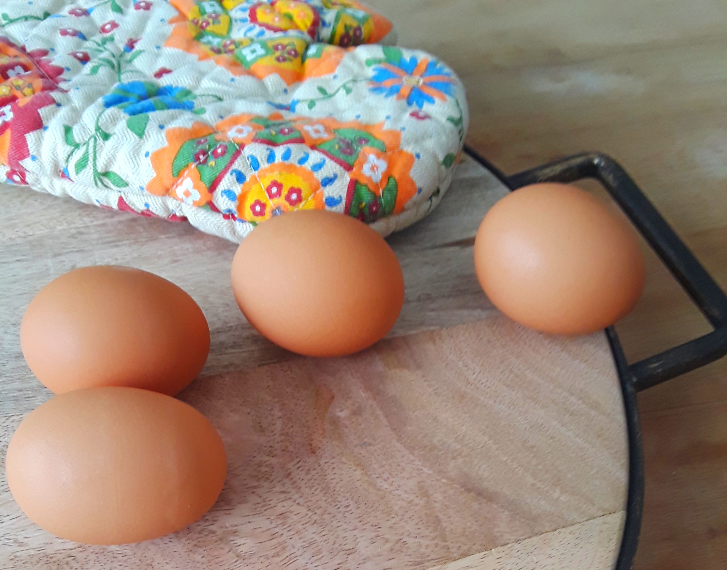 four brown eggs