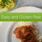 chicken cooked in tomato sauce served with salad and rice