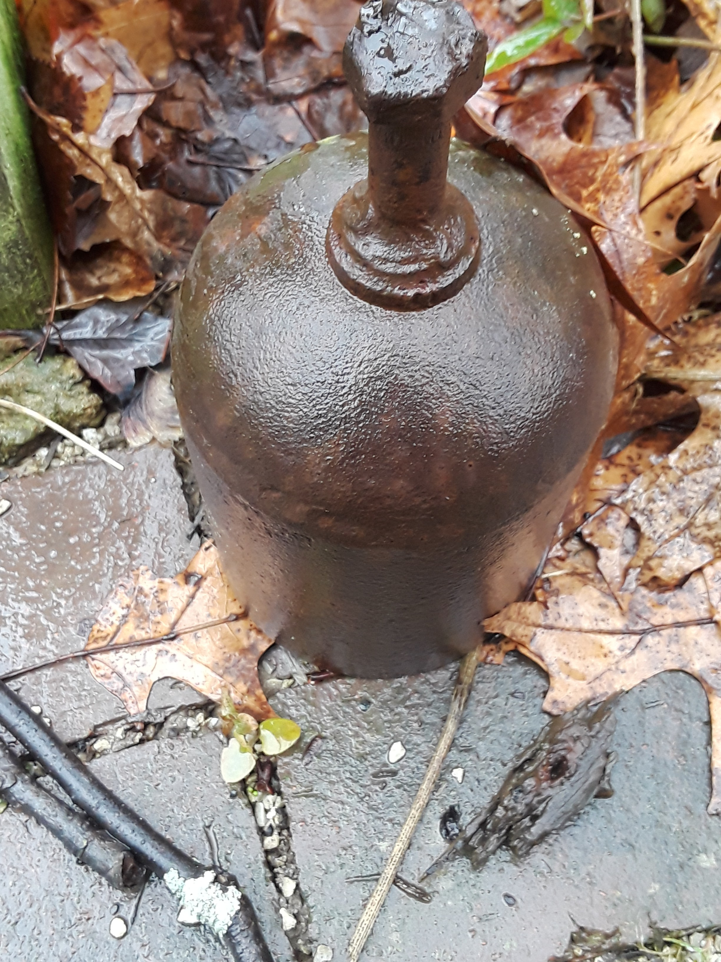 A helium tank is cut and welded to make a bell.