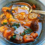 chorizo stew in blue bowl