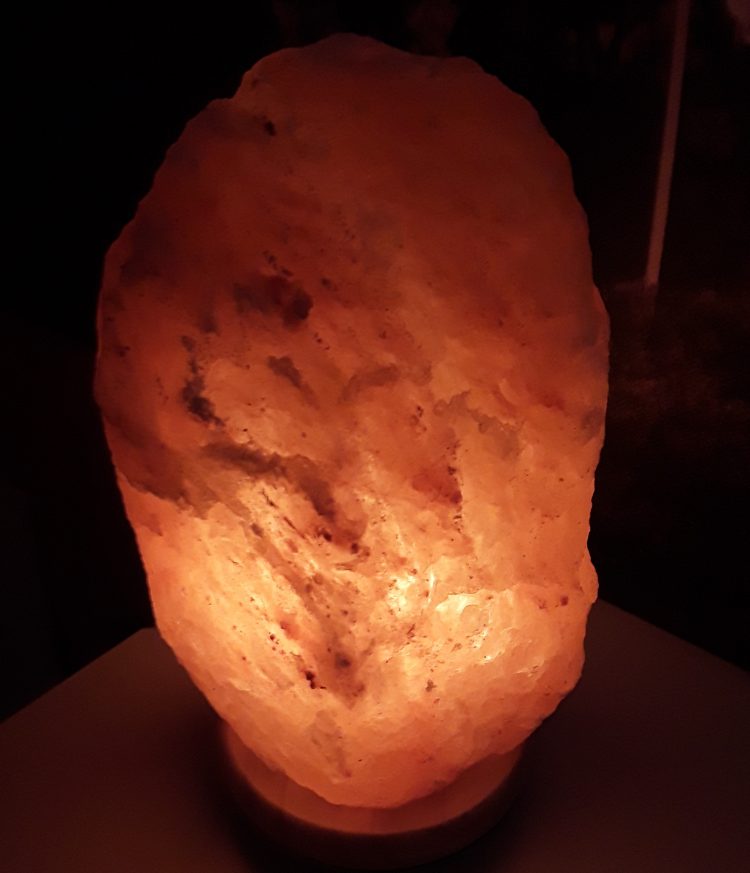 Himalayan salt lamp emits a rosy glow