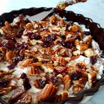 toasted pecans and dried cranberries top cream cheese beef dip
