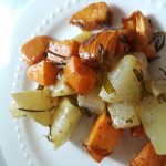 Cubes of kohlrabi and sweet potato are baked with rosemary and tarragon