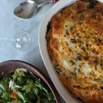 egg casserole dinner with side salad and white wine