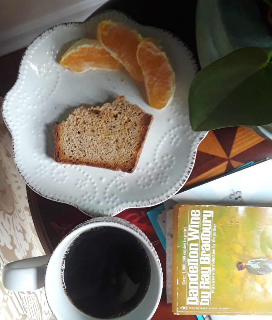 black coffee, dry toast and orange slices are a typical breakfast
