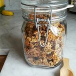 Homemade granola in lidded glass jar