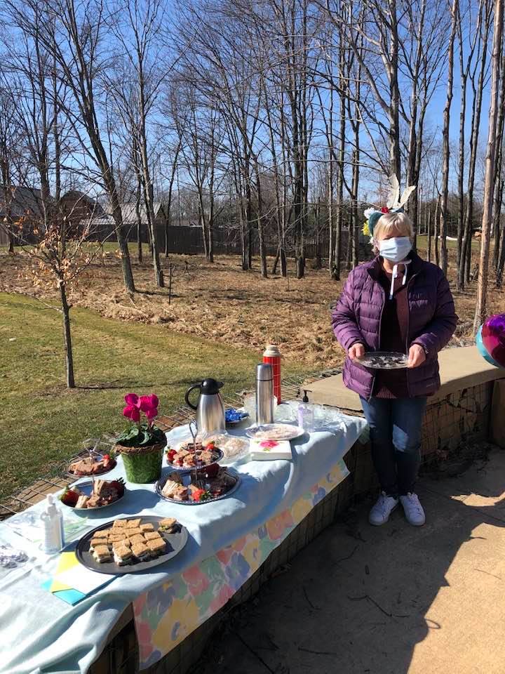a tea party buffet set up outdoors as a picnic