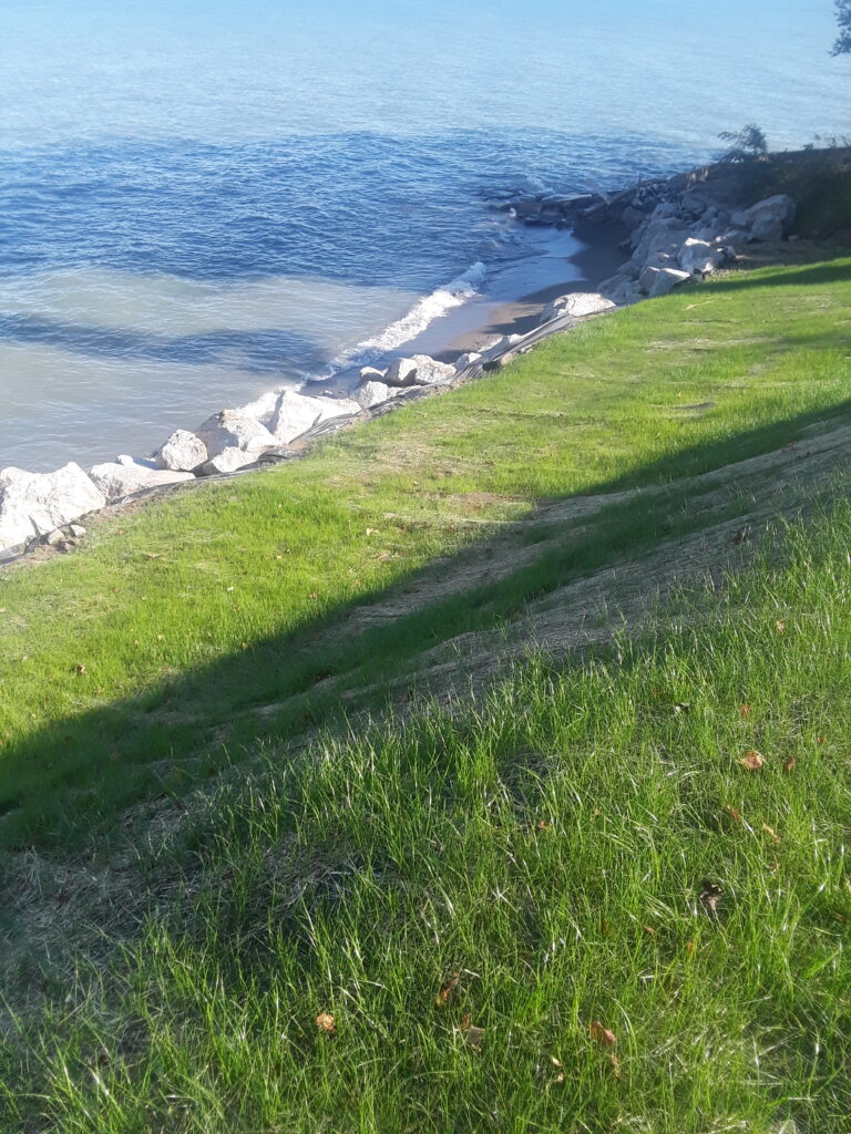 Large stone protects the shoreline.