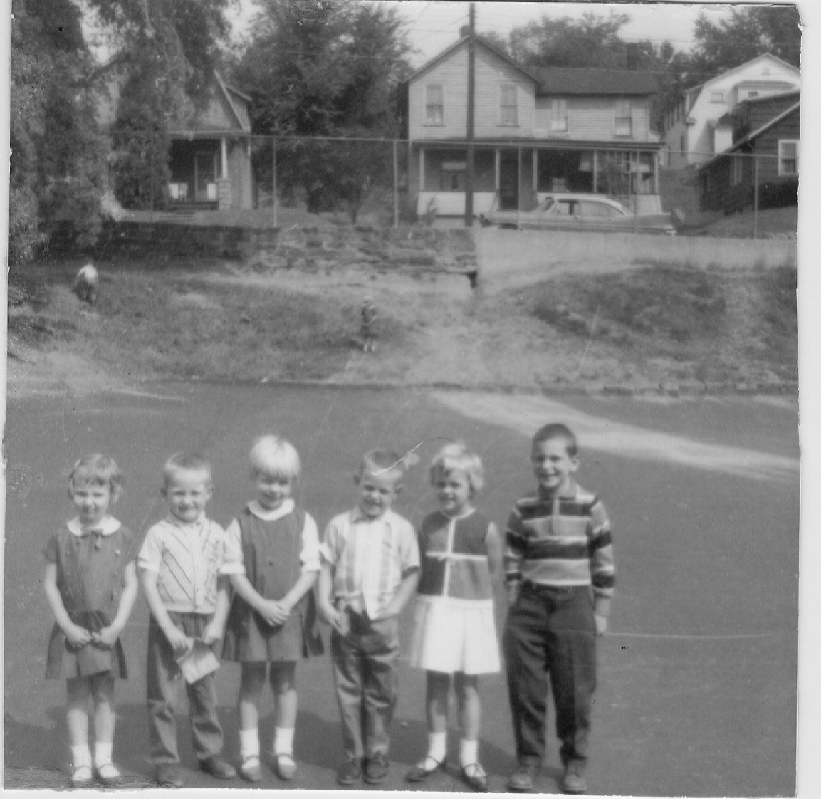 Six kindergarten students line up for a photo.