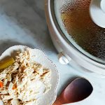 slow cooker shredded chicken is plated and ready to eat.
