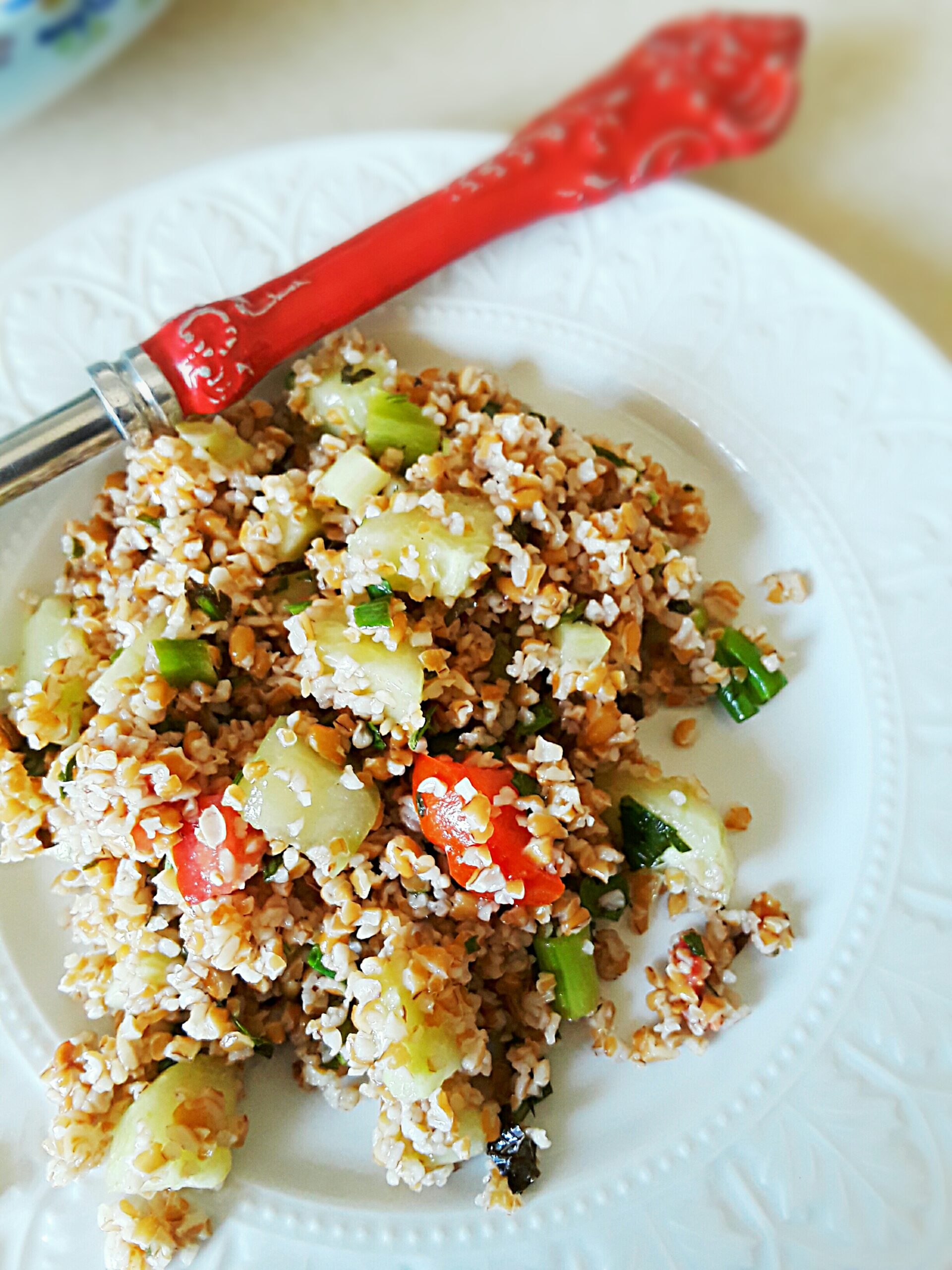 tabbouleh with cucumber and tomato chunks